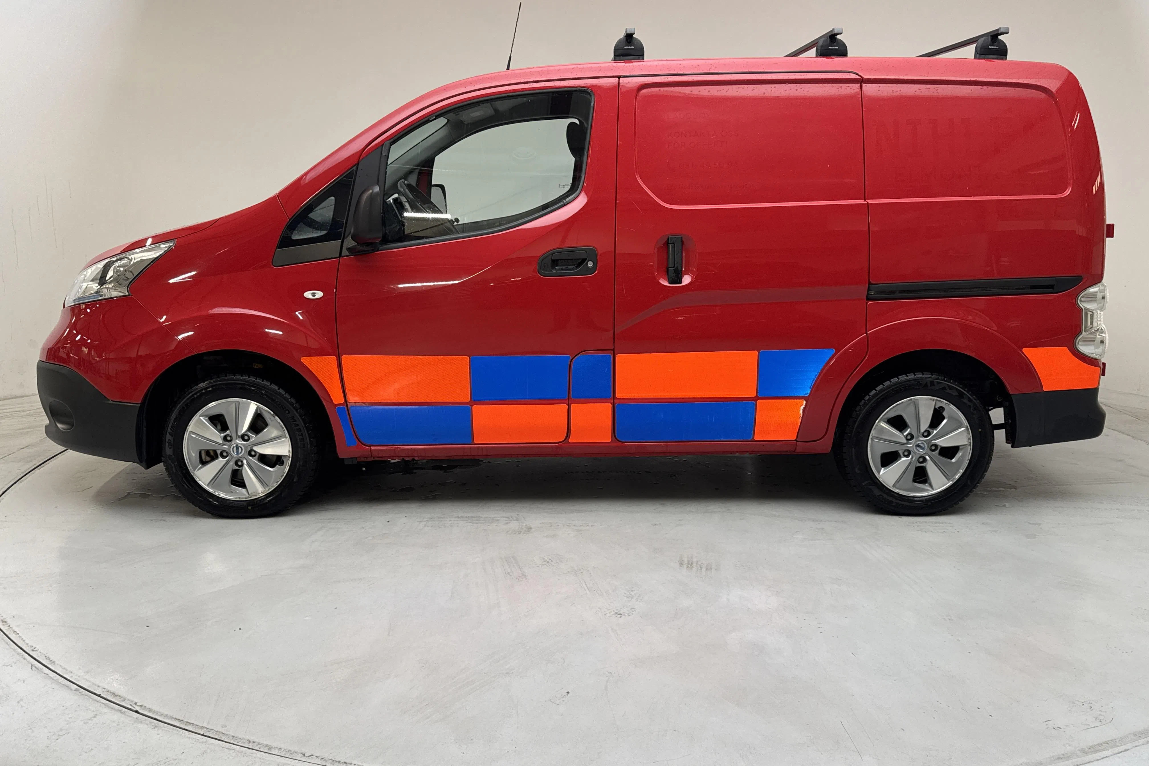 Presentationsfoto 2 av 14: Nissan e-NV200 40kWh (109hk) - 6 969 mil - Automat - röd - 2020