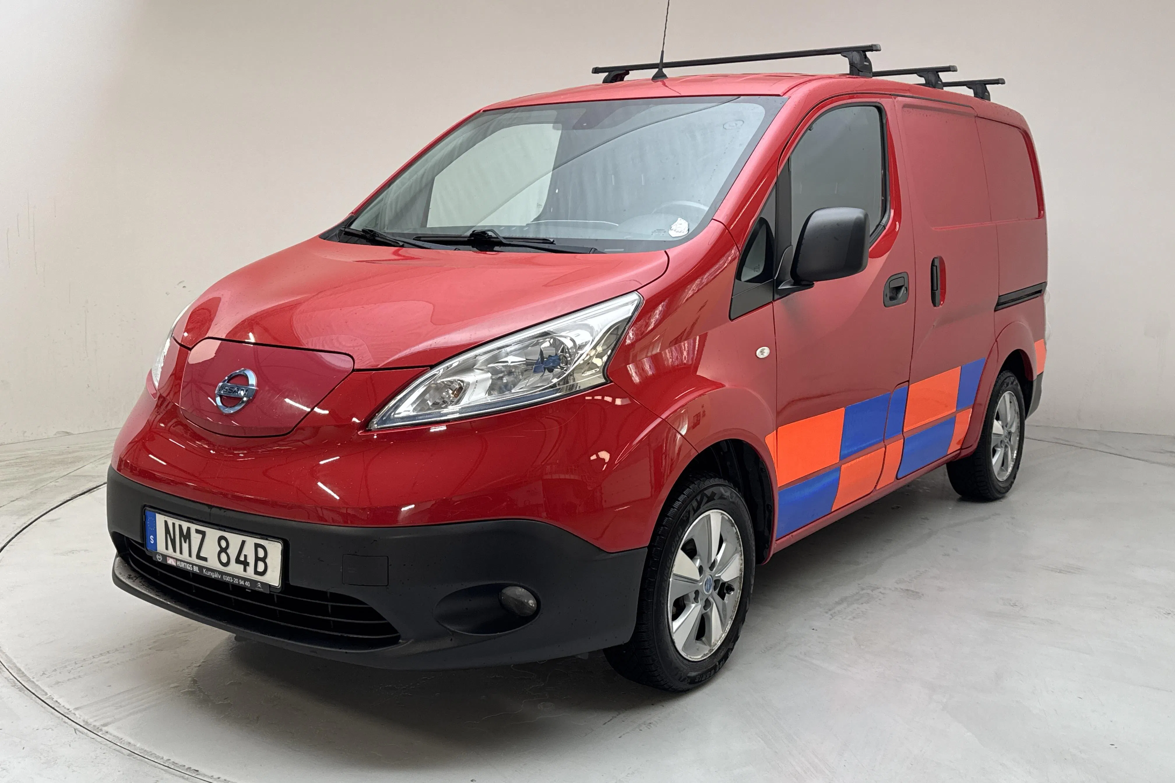 Presentationsfoto 1 av 14: Nissan e-NV200 40kWh (109hk) - 6 969 mil - Automat - röd - 2020