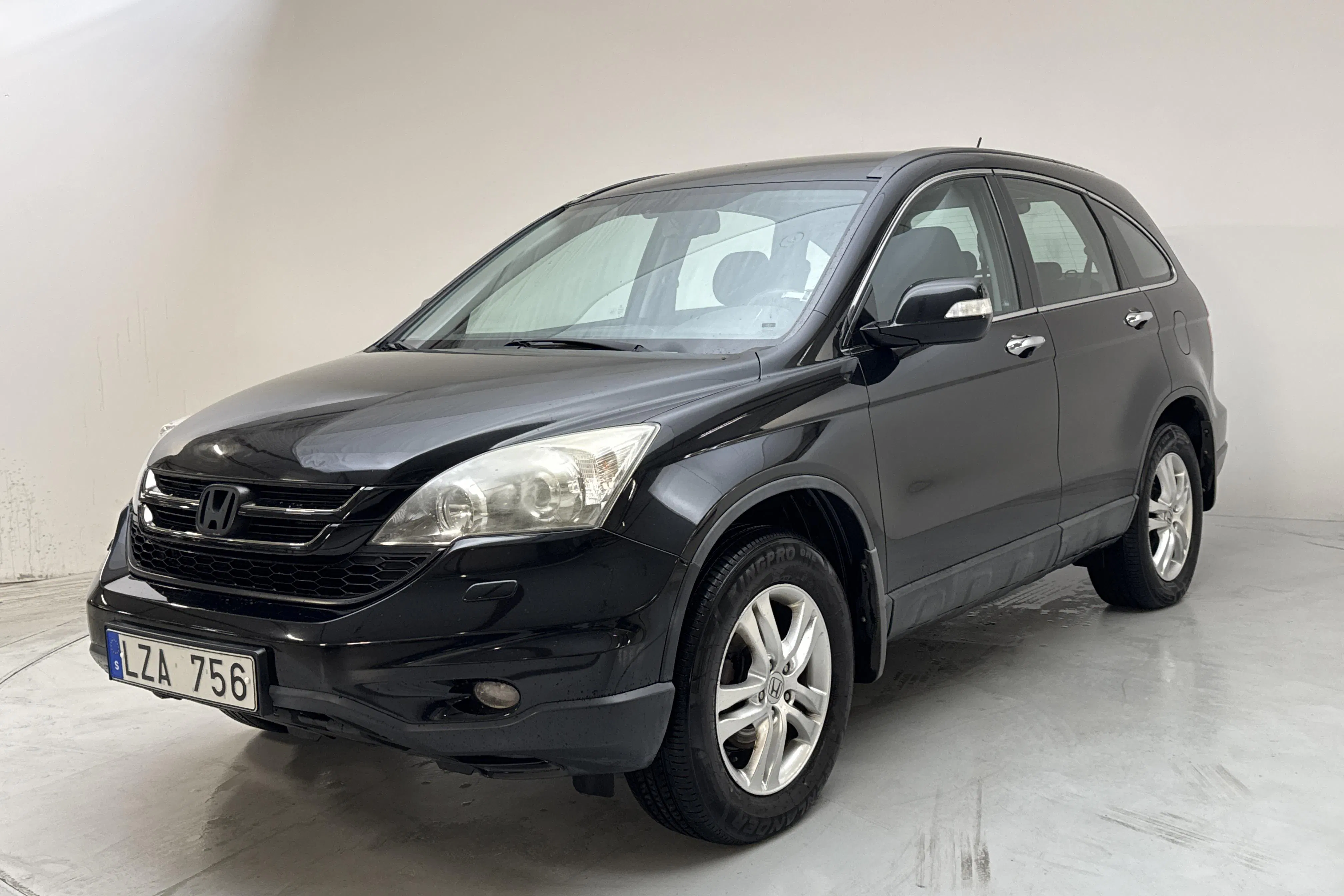 Presentationsfoto 1 av 11: Honda CR-V 2.2 I-CTDI (150hk) - 13 859 mil - Automat - svart - 2011