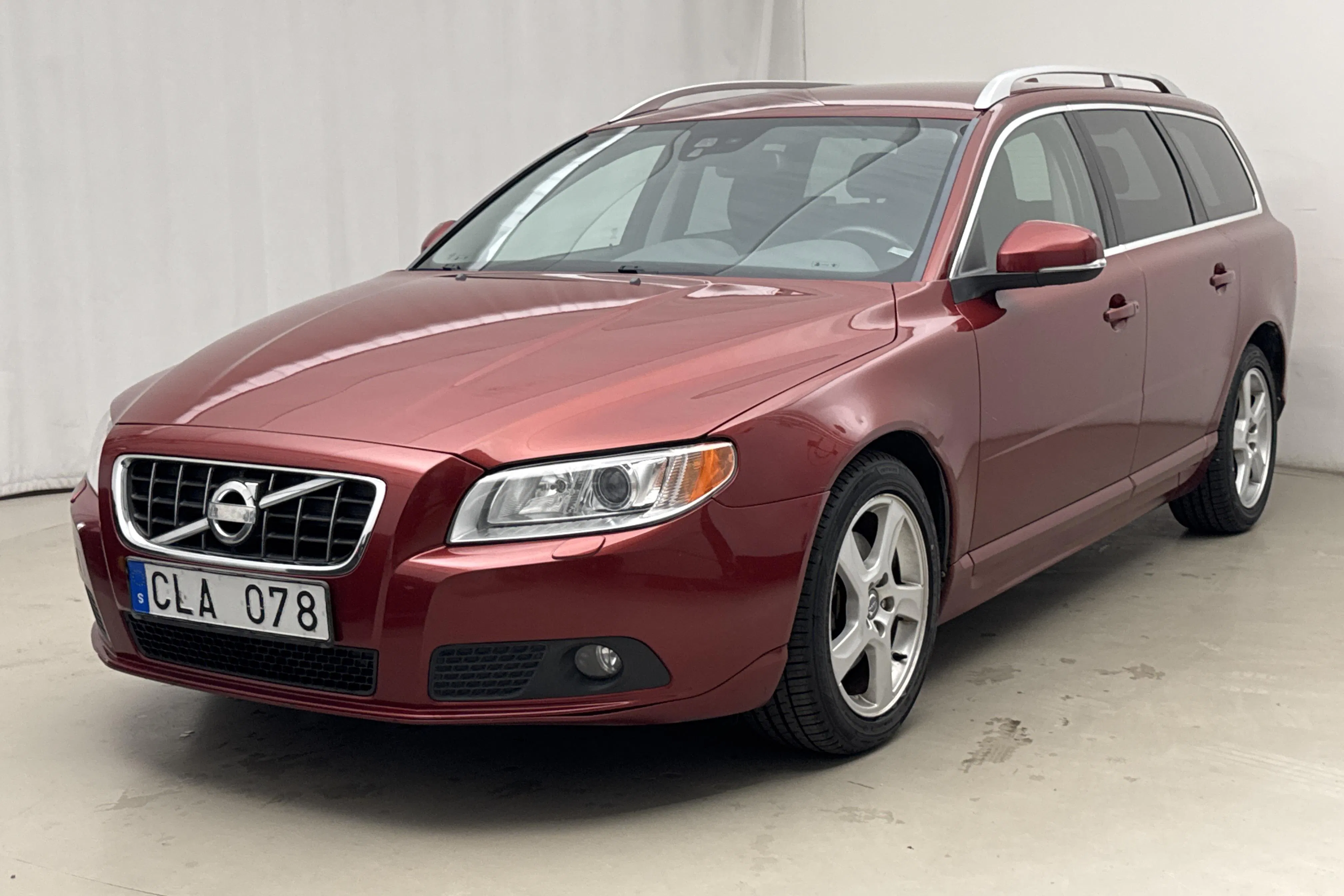 Presentationsfoto 1 av 18: Volvo V70 II 1.6D DRIVe (115hk) - 12 590 mil - Automat - röd - 2012