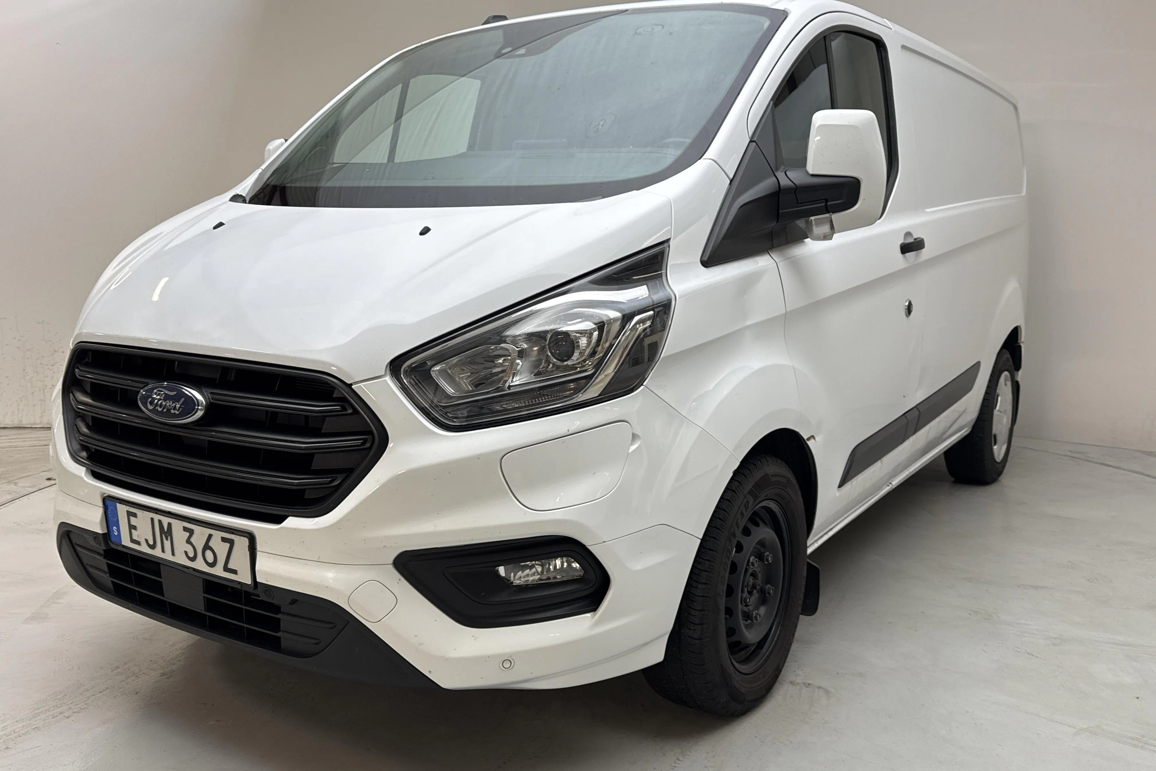Presentationsfoto 1 av 12: Ford Transit Custom 340 PHEV (120hk) - 11 960 mil - Automat - vit - 2022
