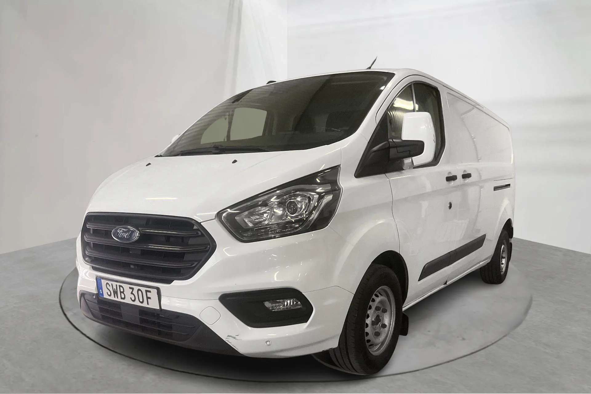 Presentationsfoto 1 av 18: Ford Transit Custom 300 MHEV (130hk) - 12 231 mil - Manuell - vit - 2023