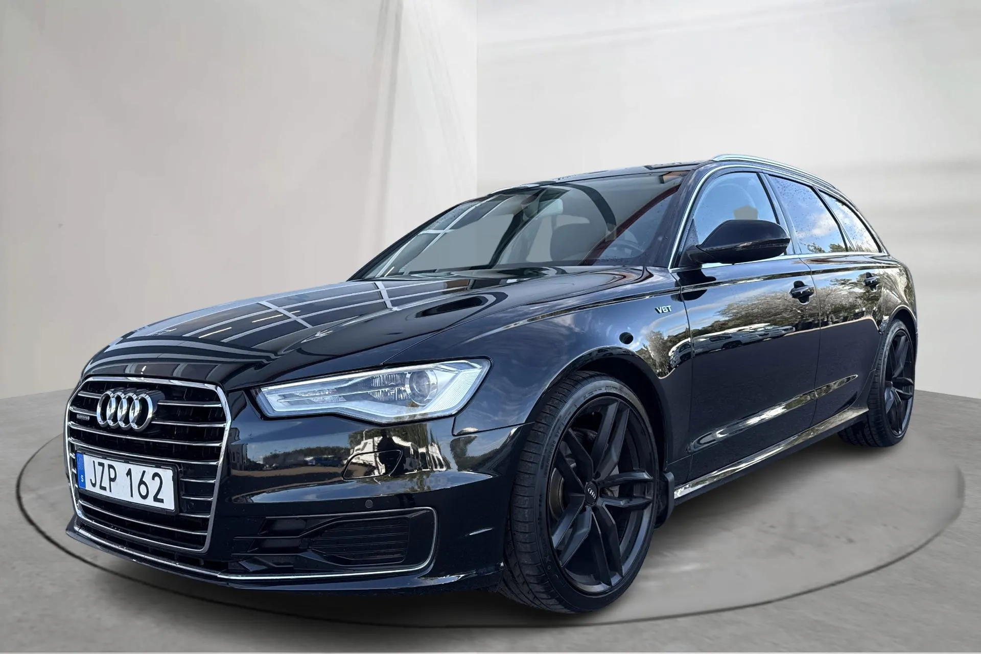 Presentationsfoto 1 av 19: Audi A6 3.0 TDI Avant quattro (218hk) - 15 657 mil - Automat - svart - 2016