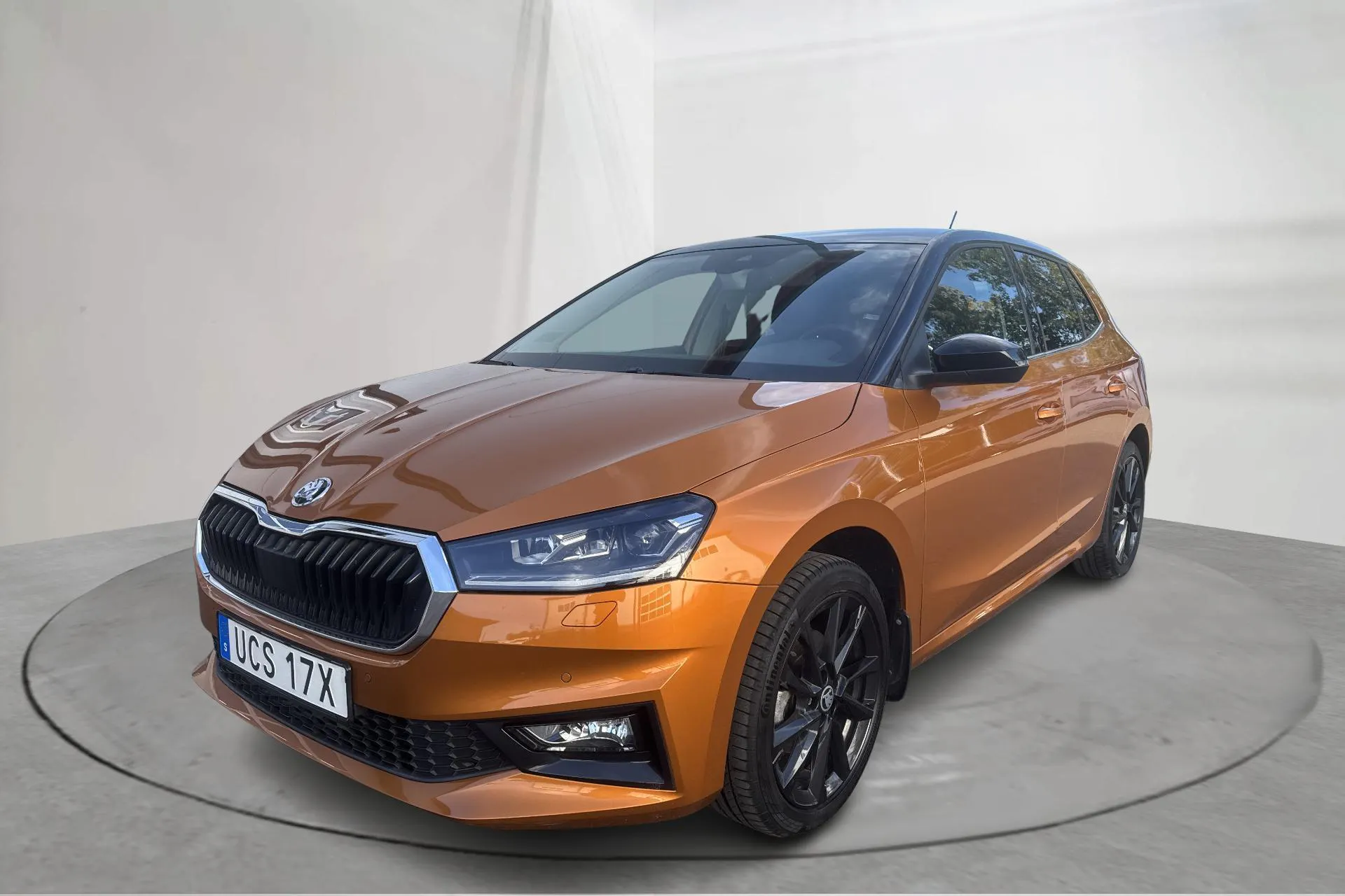 Presentation photo 1 of 15: Skoda Fabia 1.0 TSI (110hk) - 18 770 km - Automatic - orange - 2022