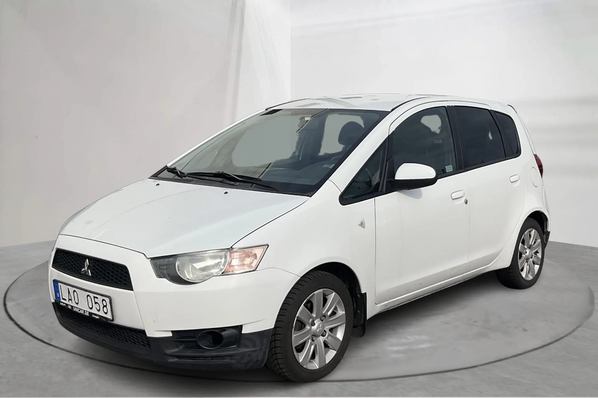 Presentationsfoto 1 av 13: Mitsubishi Colt 1.3 5dr (95hk) - 11 645 mil - Manuell - vit - 2011