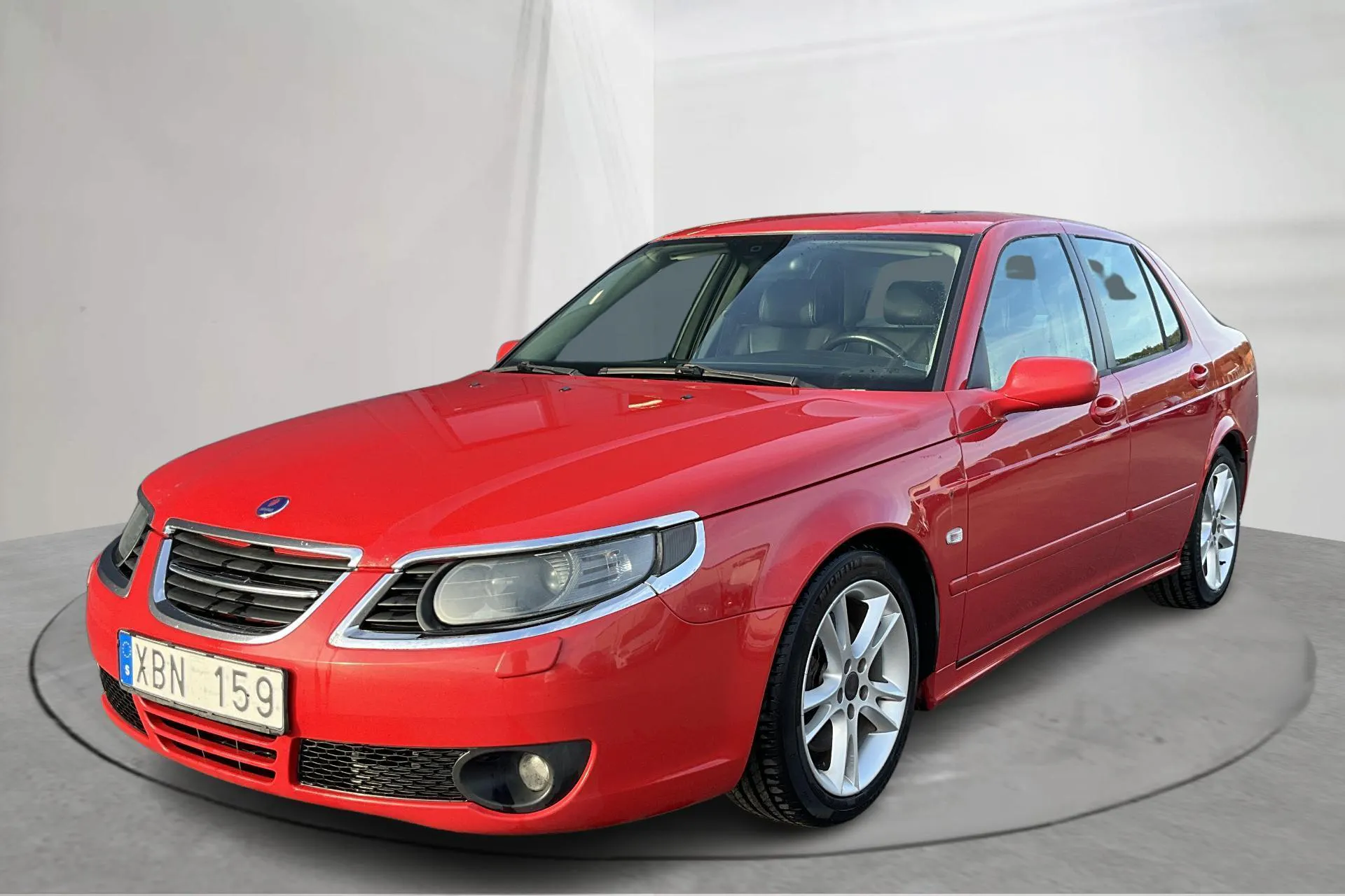 Presentationsfoto 1 av 14: Saab 9-5 2.3T Aero SportSedan (260hk) - 25 032 mil - Manuell - röd - 2006