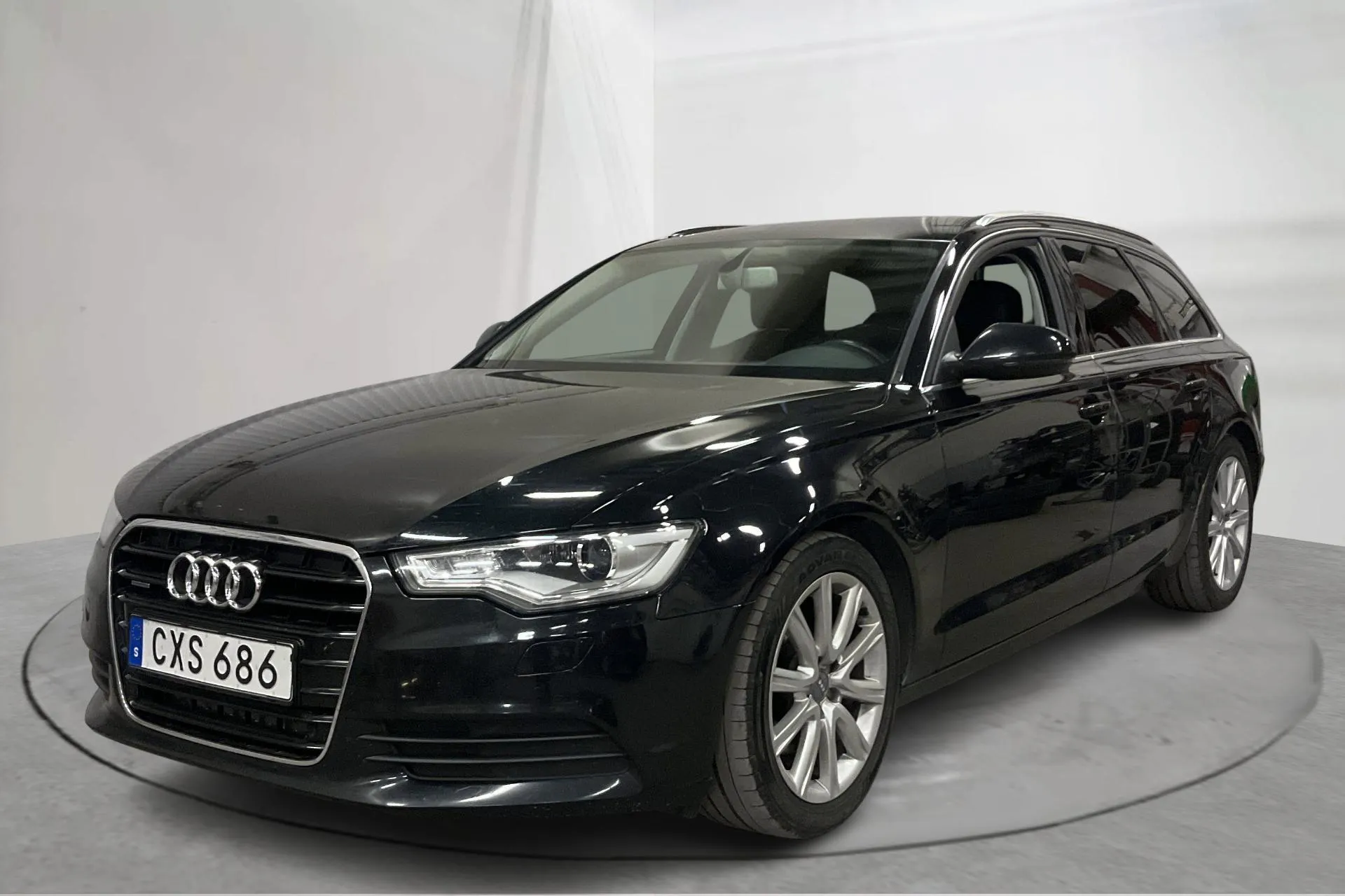 Presentationsfoto 1 av 15: Audi A6 3.0 TDI Avant quattro (204hk) - 21 186 mil - Automat - svart - 2014