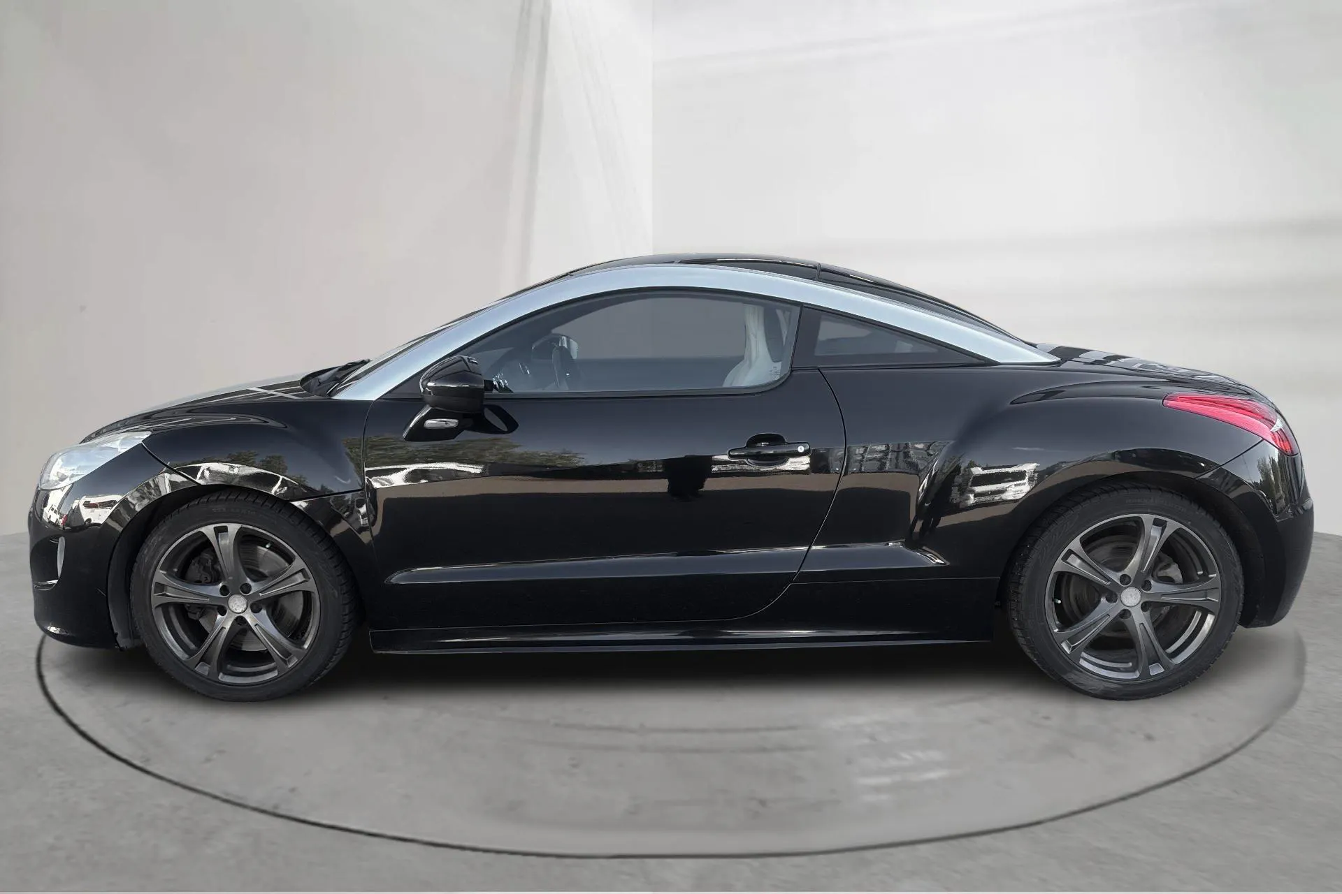 Presentation photo 2 of 14: Peugeot RCZ 1.6 Turbo (200hk) - 93 370 km - Manual - black - 2010