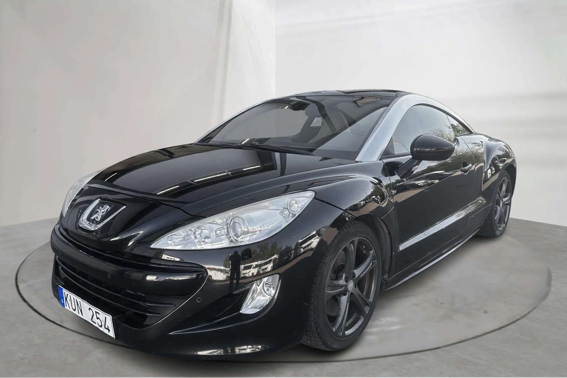 Presentation photo 1 of 14: Peugeot RCZ 1.6 Turbo (200hk) - 93 370 km - Manual - black - 2010