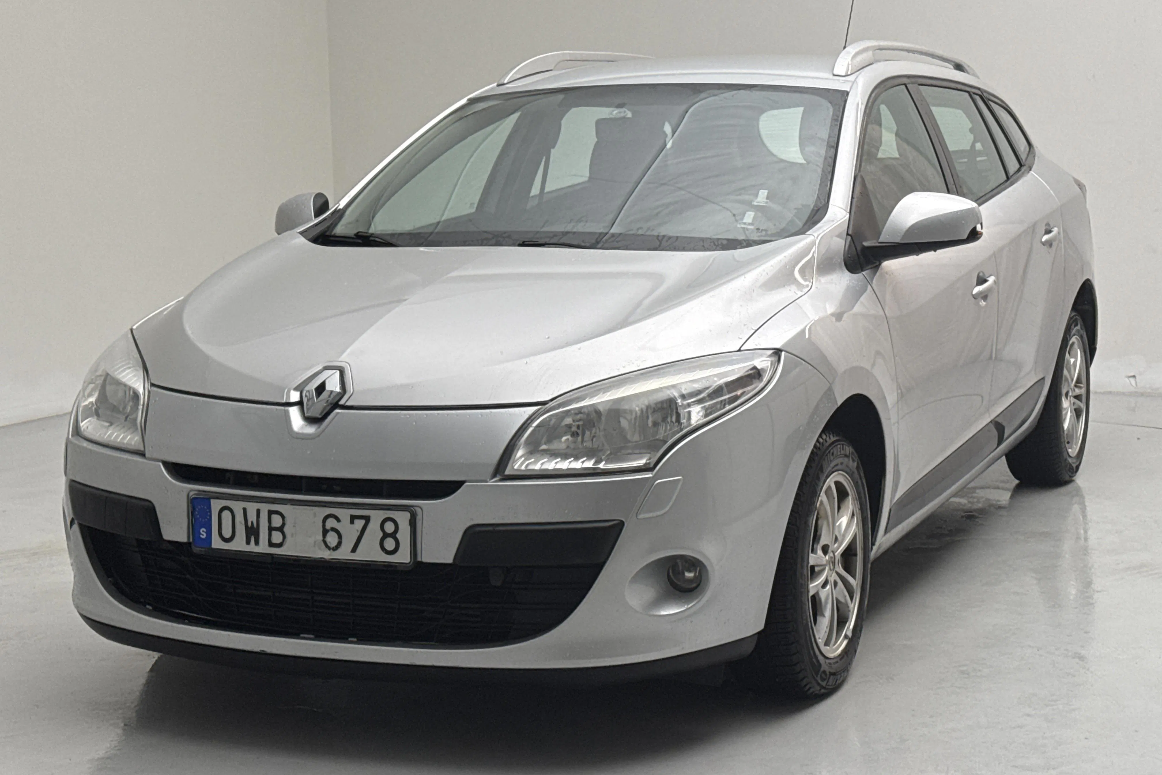 Presentationsfoto 1 av 11: Renault Mégane Phas III 1.5 dCi Sports Tourer (90hk) - 22 629 mil - Manuell - silver - 2010