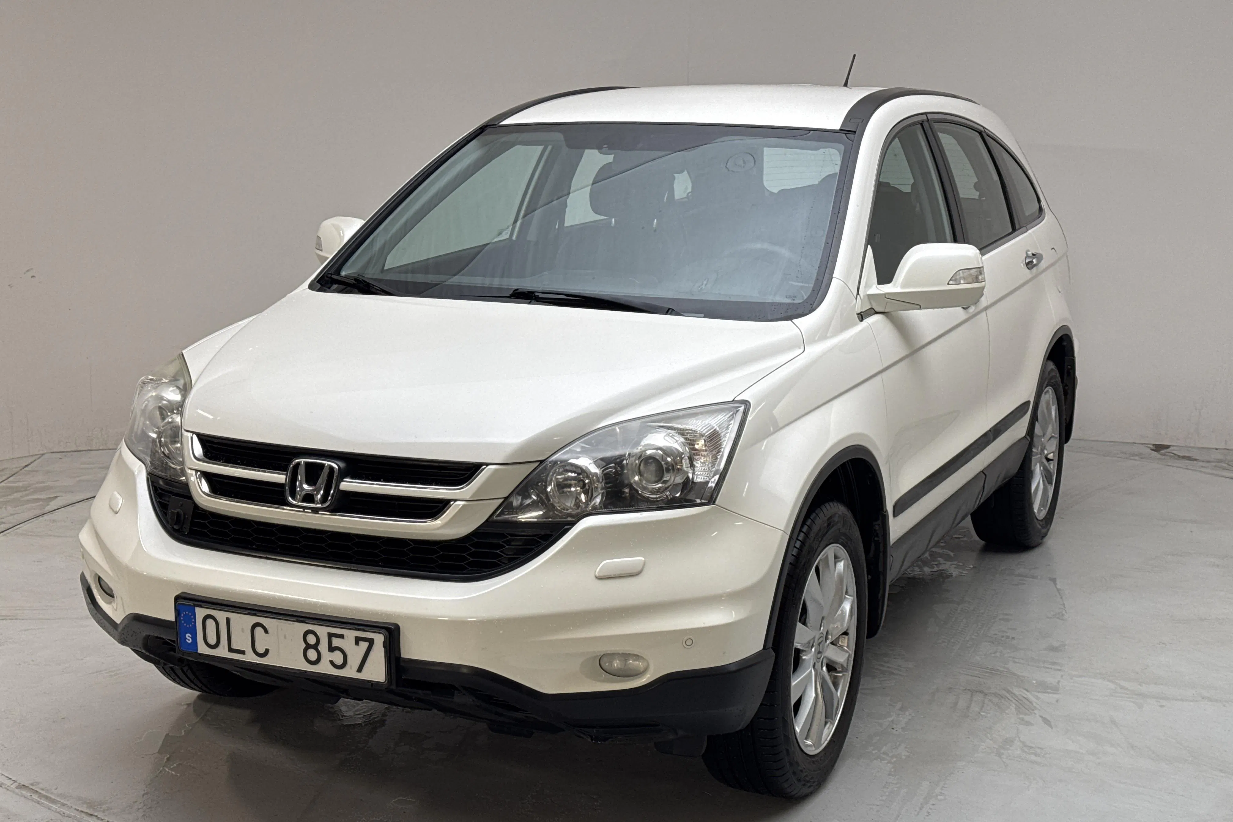 Presentationsfoto 1 av 13: Honda CR-V 2.0 I-VTEC (150hk) - 14 318 mil - Manuell - vit - 2010
