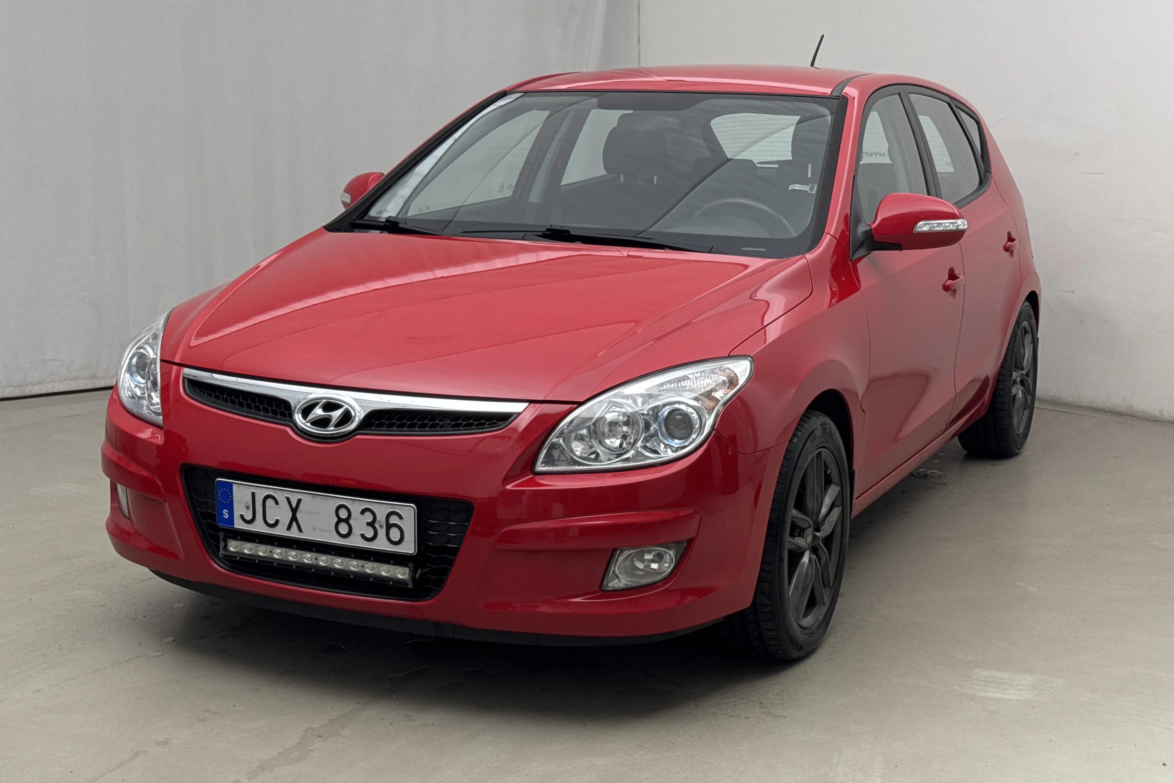 Presentationsfoto 1 av 14: Hyundai i30 1.6 CRDi 5dr (90hk) - 9 259 mil - Manuell - röd - 2009