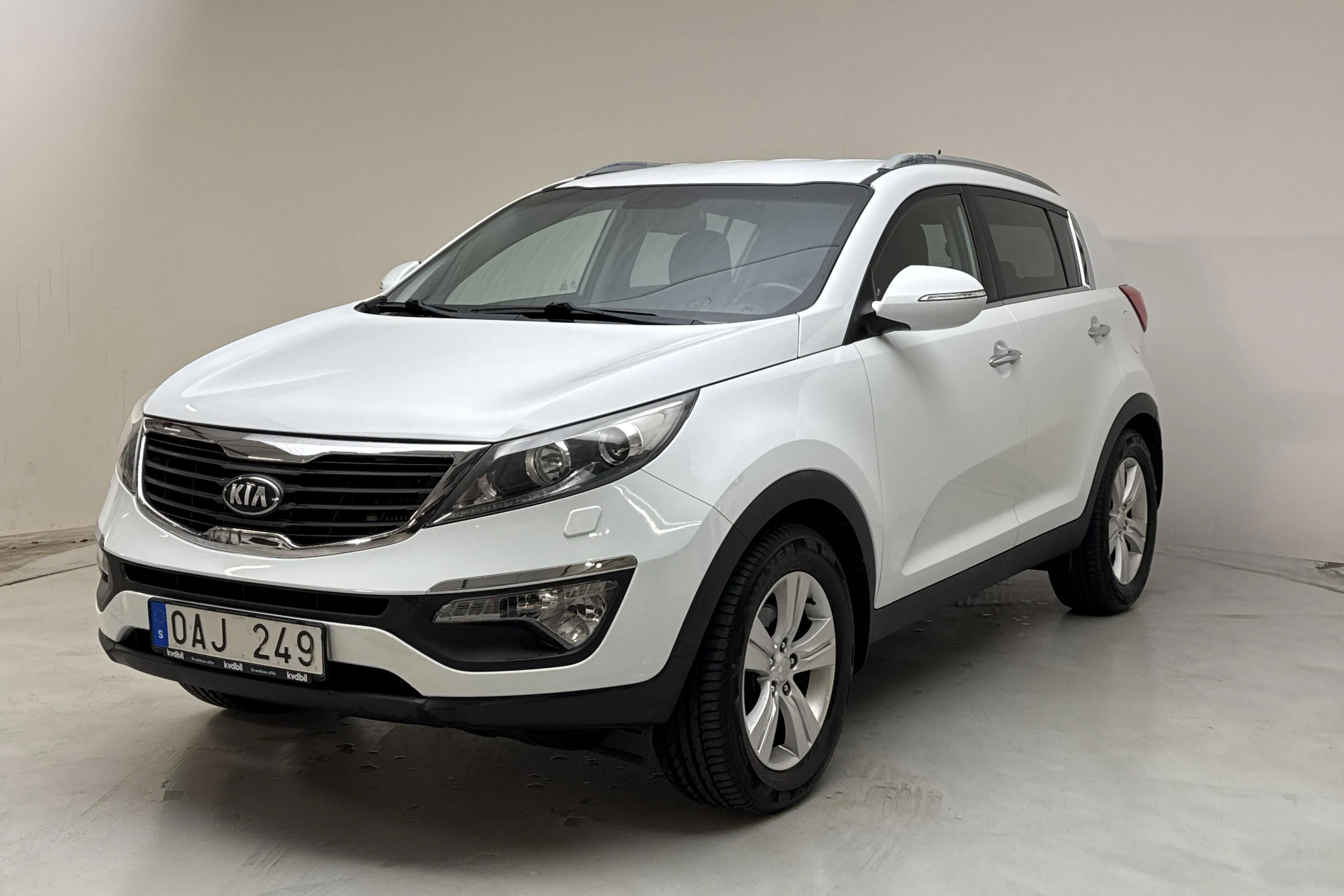 Presentationsfoto 1 av 12: KIA Sportage 1.7 CRDi 2WD (115hk) - 19 920 mil - Manuell - vit - 2013