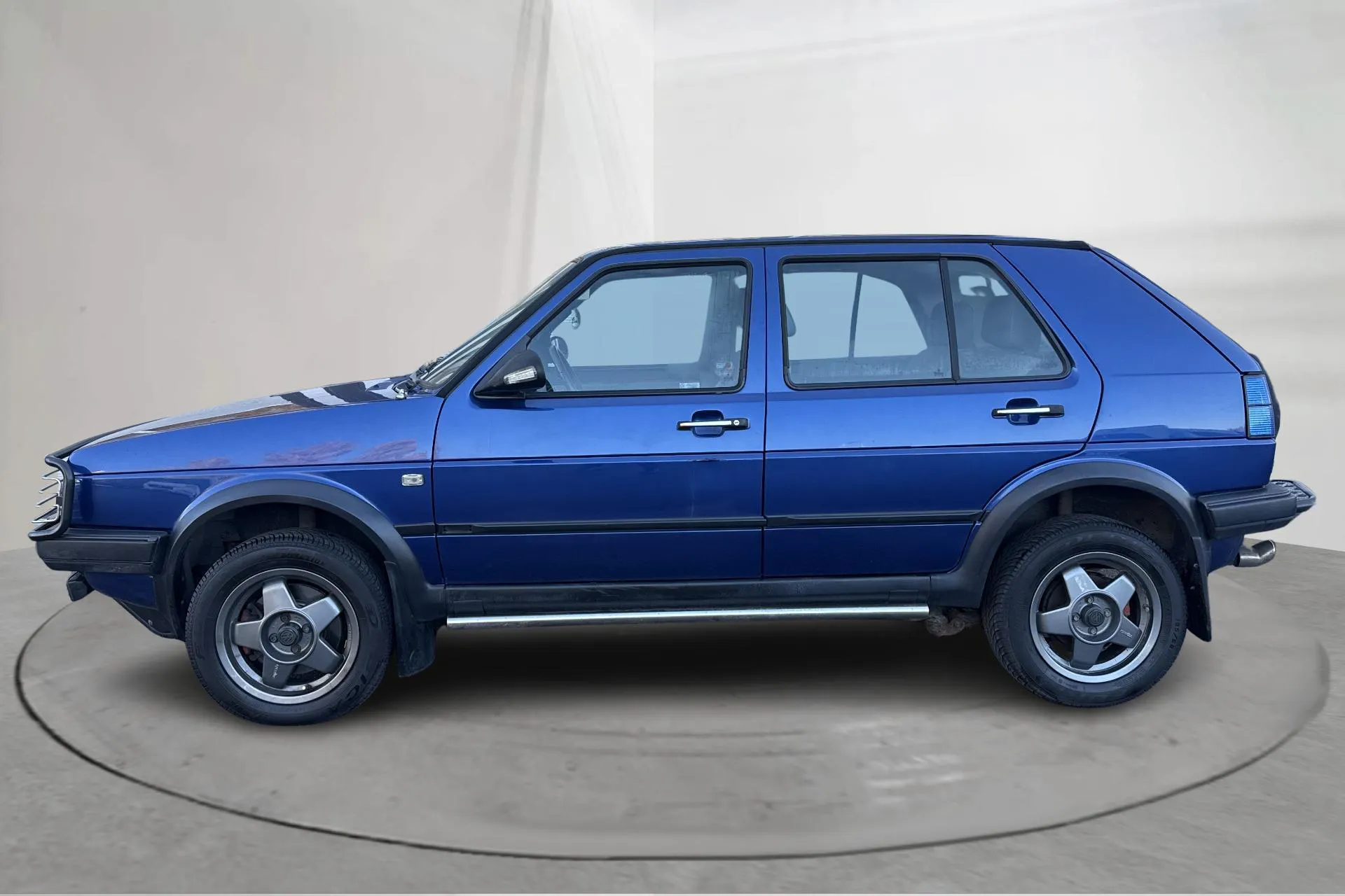 Presentationsfoto 2 av 21: VW GOLF SYNCRO CL Golf II Country Syncro 1.8 (98hk) - 22 726 mil - Manuell - blå - 1990