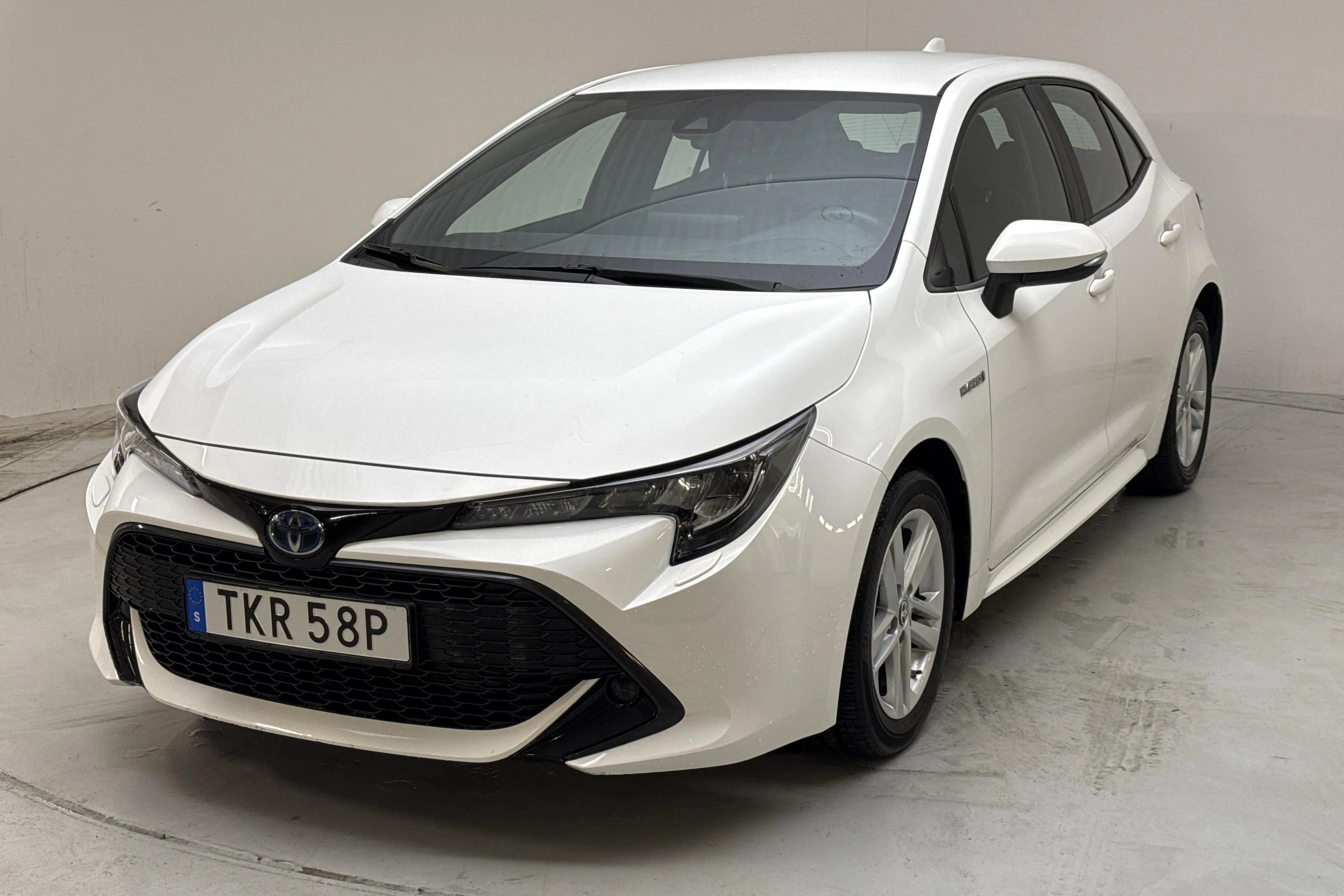 Presentationsfoto 1 av 13: Toyota Corolla 1.8 Hybrid 5dr (122hk) - 2 831 mil - Automat - vit - 2020