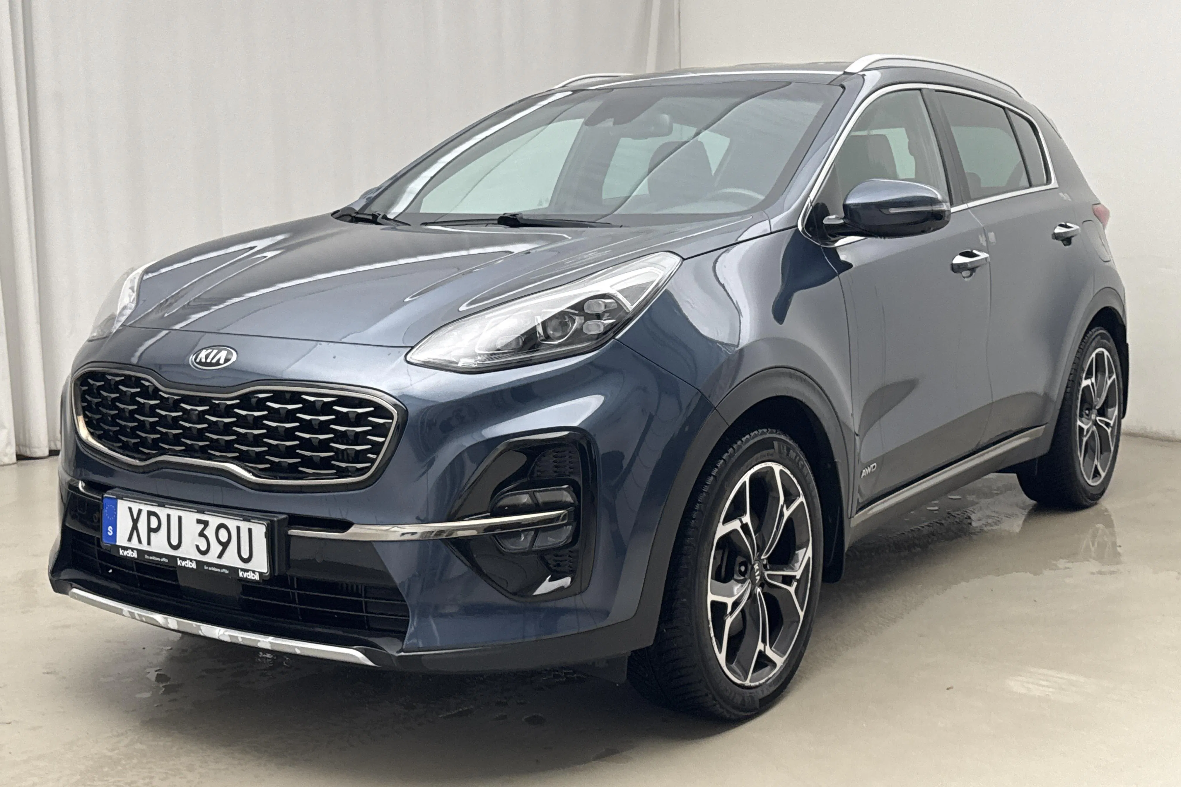 Presentationsfoto 1 av 16: KIA Sportage 1.6 T-GDI AWD (177hk) - 5 140 mil - Automat - blå - 2019