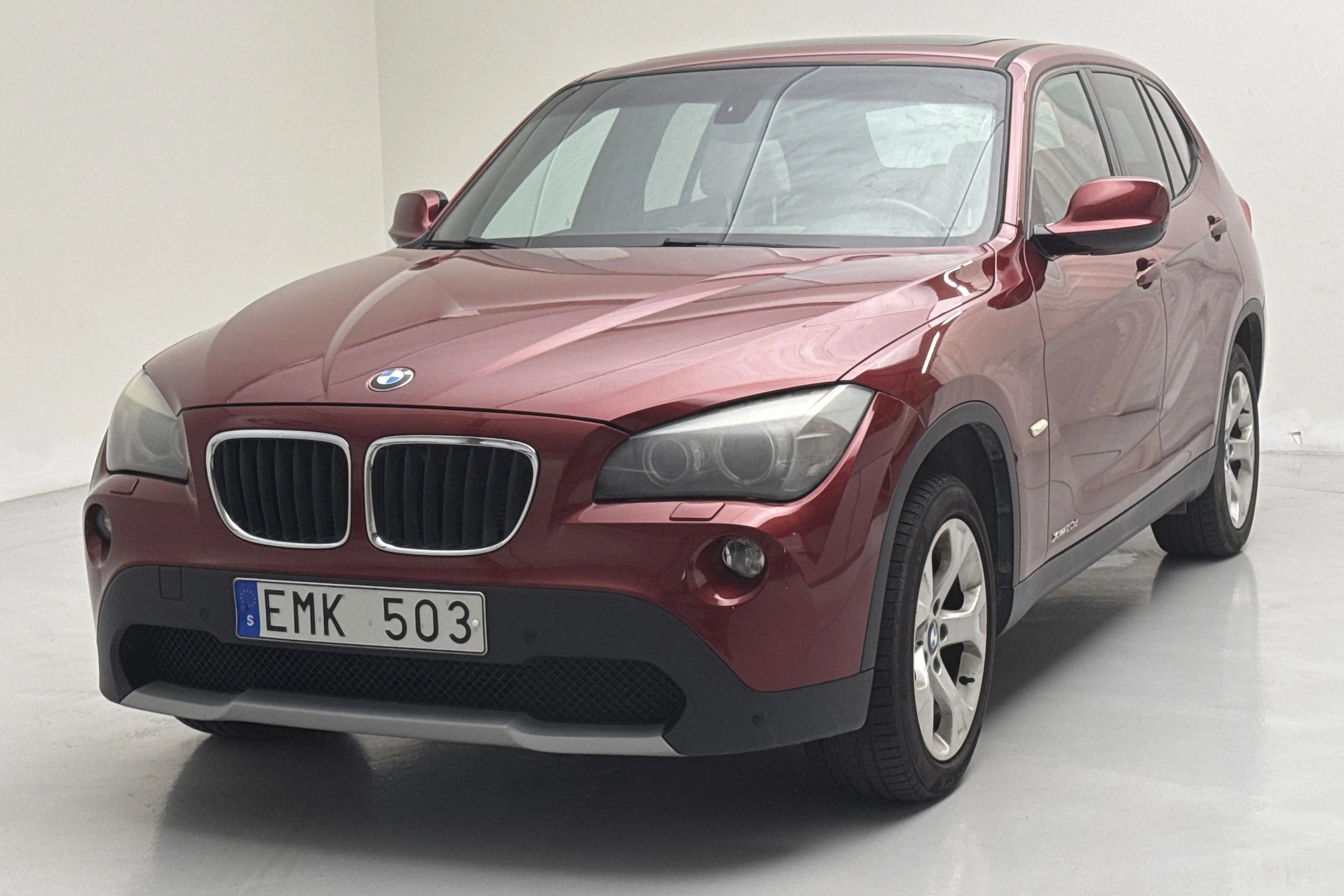 Presentationsfoto 1 av 15: BMW X1 xDrive20d, E84 (177hk) - 8 279 mil - Automat - röd - 2011
