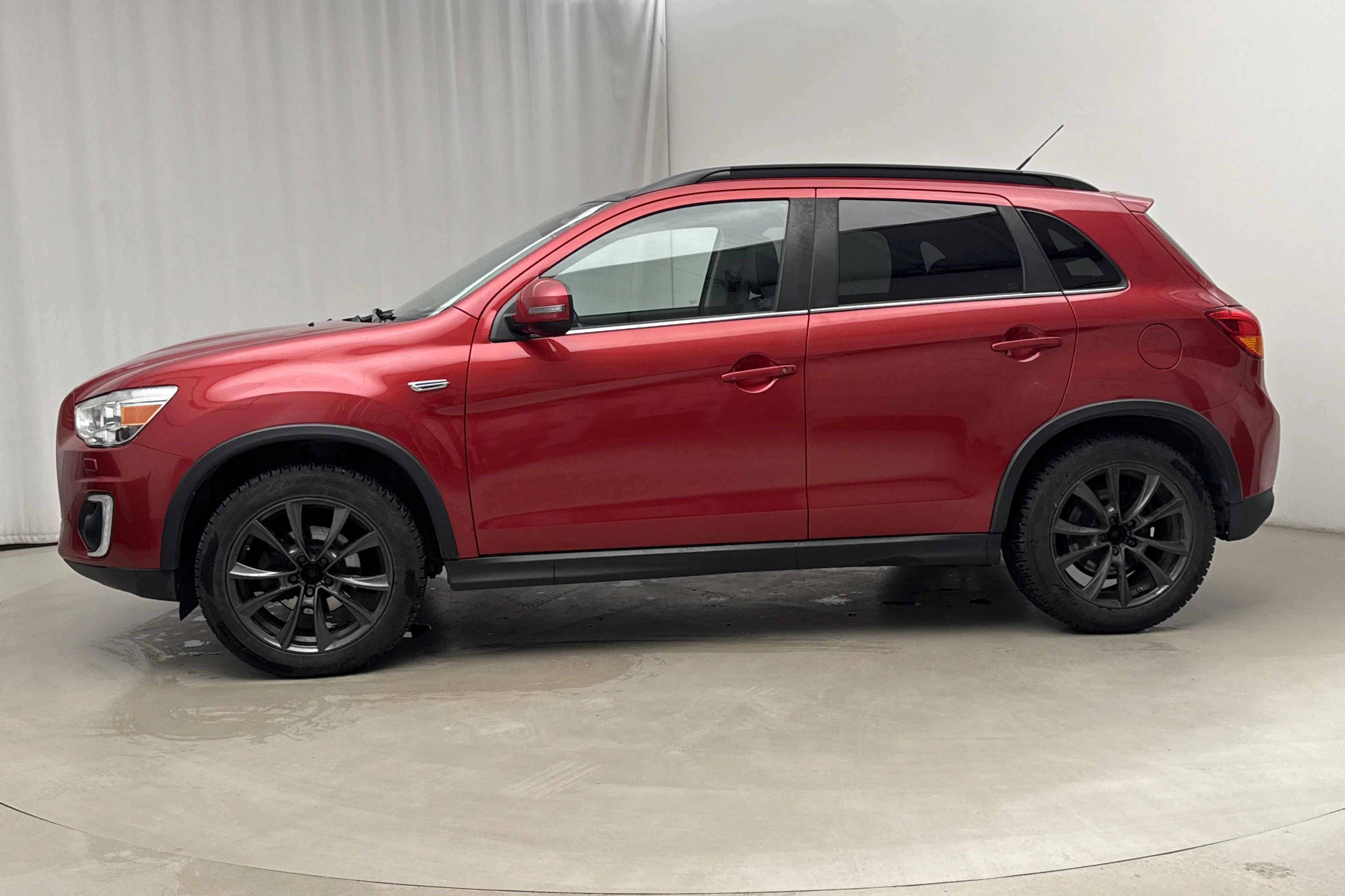 Presentationsfoto 2 av 19: Mitsubishi ASX 2.2D 4WD (150hk) - 11 892 mil - Automat - röd - 2016