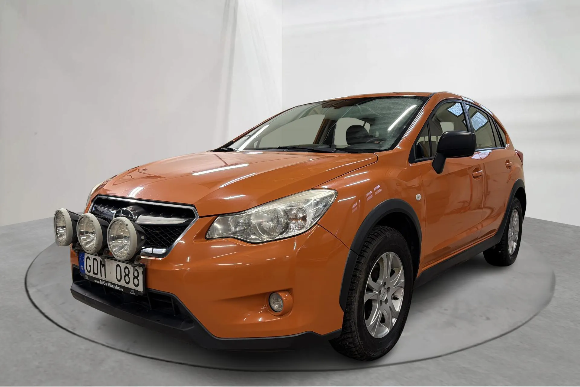 Presentationsfoto 1 av 14: Subaru XV 2.0i (150hk) - 19 127 mil - Automat - orange - 2013